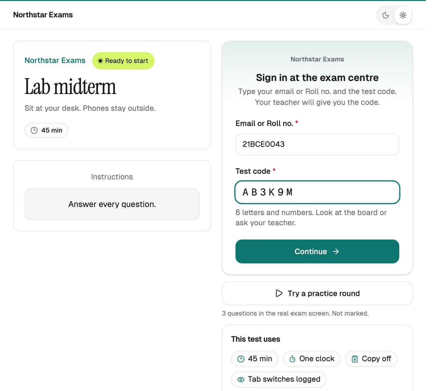 The Qwiktest test page on a lab computer: Sign in at the exam centre, with roll number 21BCE0043 and test code AB3K9M typed in